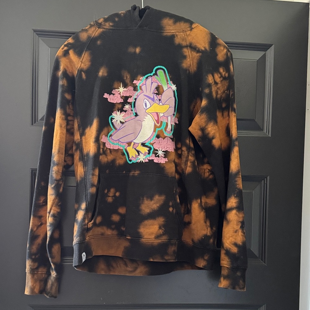 Pokémon Center Farfetch’d Black and Orange Tie-Dye Hoodie